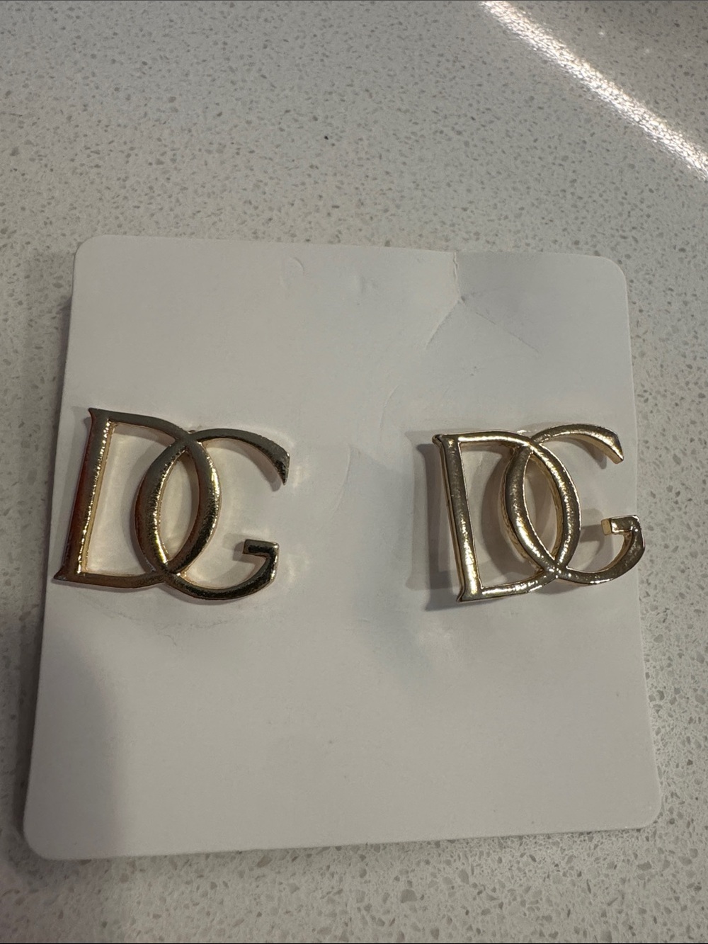 Women’s brand new gold tone earrings